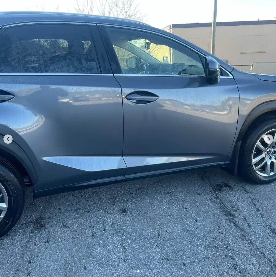 Acura MDX side panel fully repaired and refinished