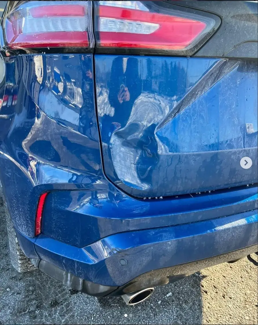 Ford Edge rear bumper damage before repair